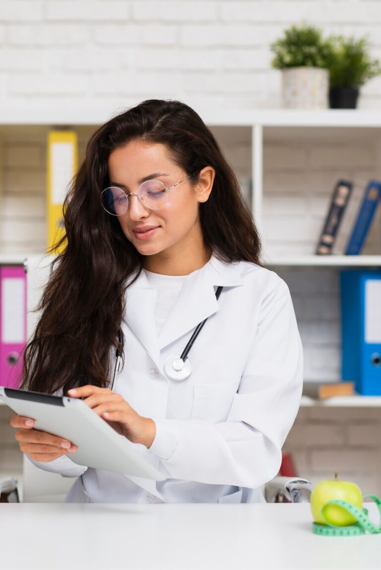 Doctor consulting patient with medical documents